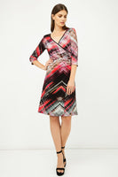 CONQUISTA FASHION - Original Print Jersey Faux Wrap Dress in Red